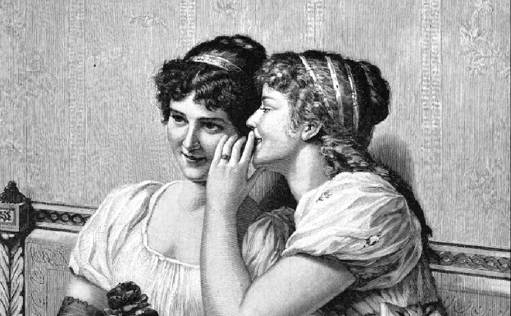 Two girls gossiping.