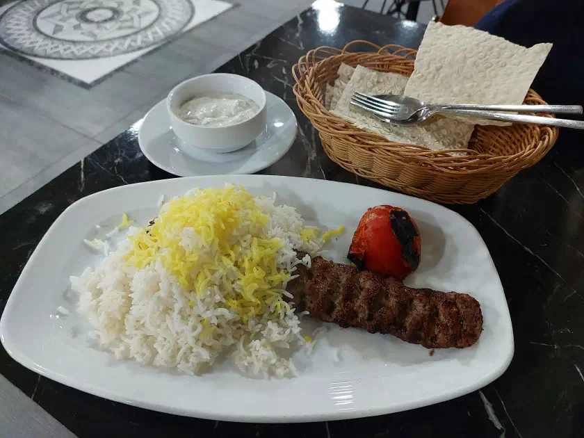 Koobideh with saffron rice, in a basement the reviews were right about
